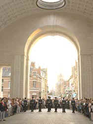 Personnel from the Queens Colour Squadron Royal Air Force Regiment participate in the daily Sounding of the Last Post ceremony at the Menin Gate Memorial in Ieper 